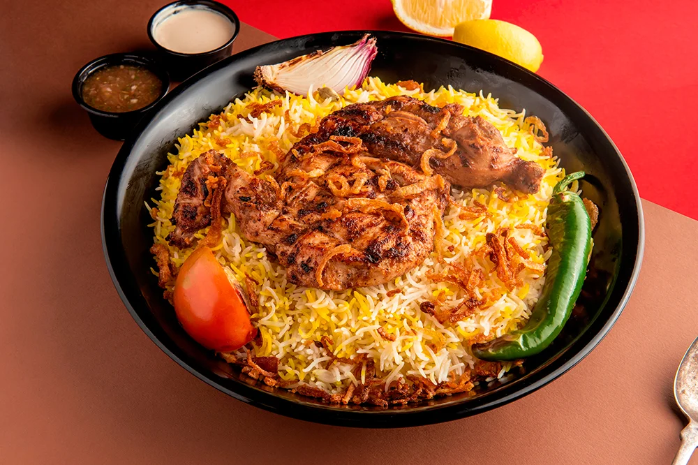 نصف دجاجة على الفحم